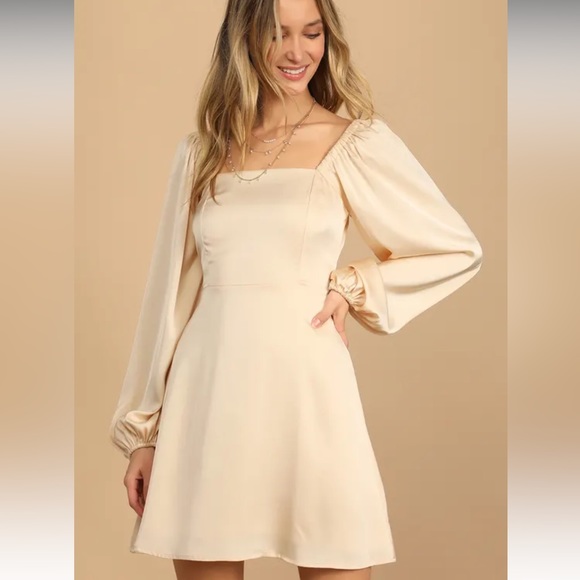 Lulus Dresses & Skirts - Lulu’s So Darling Light Peach Satin Long Sleeve
Tie-Back Mini Dress